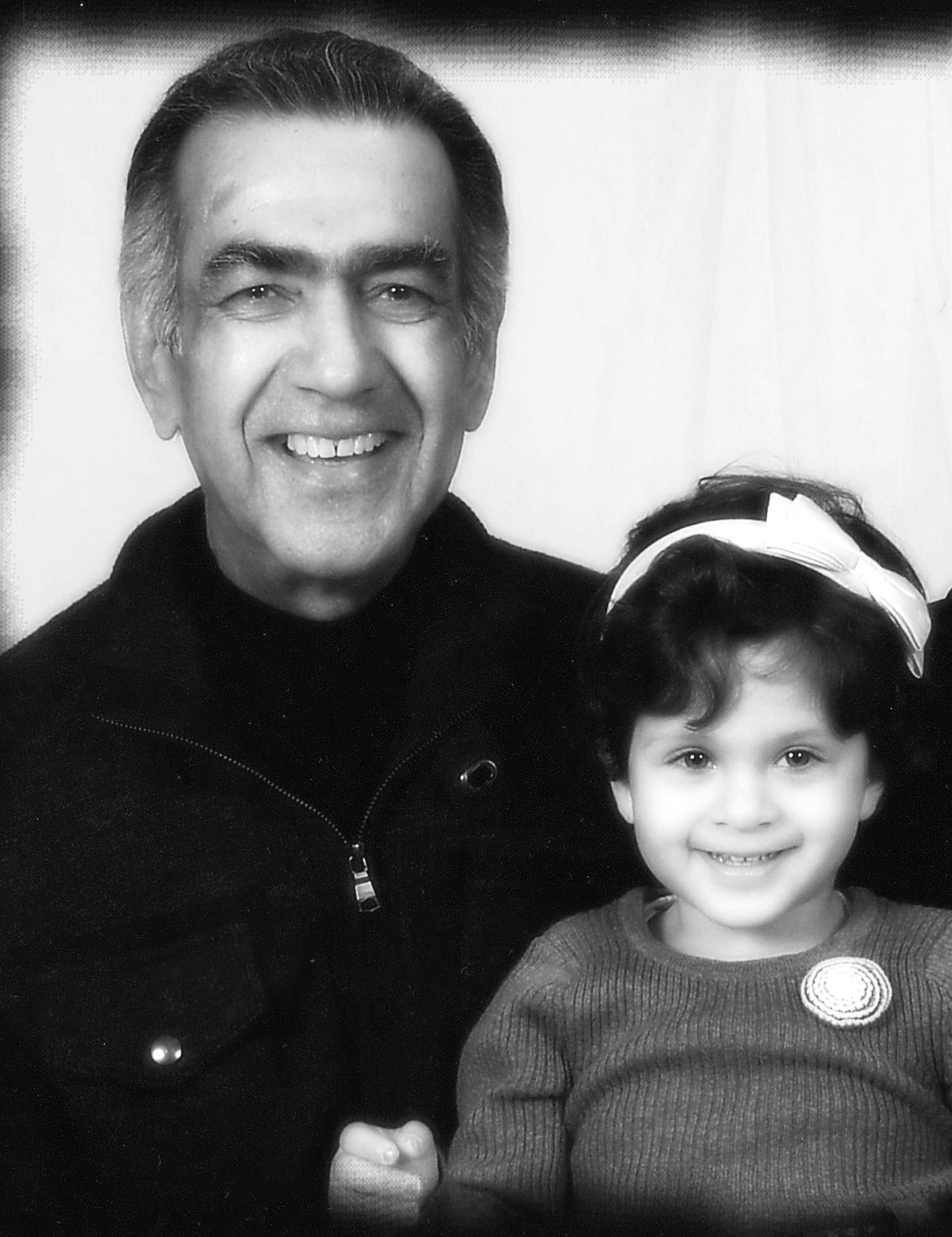Mohammad Arif Sherdel with his granddaughter Sanaa