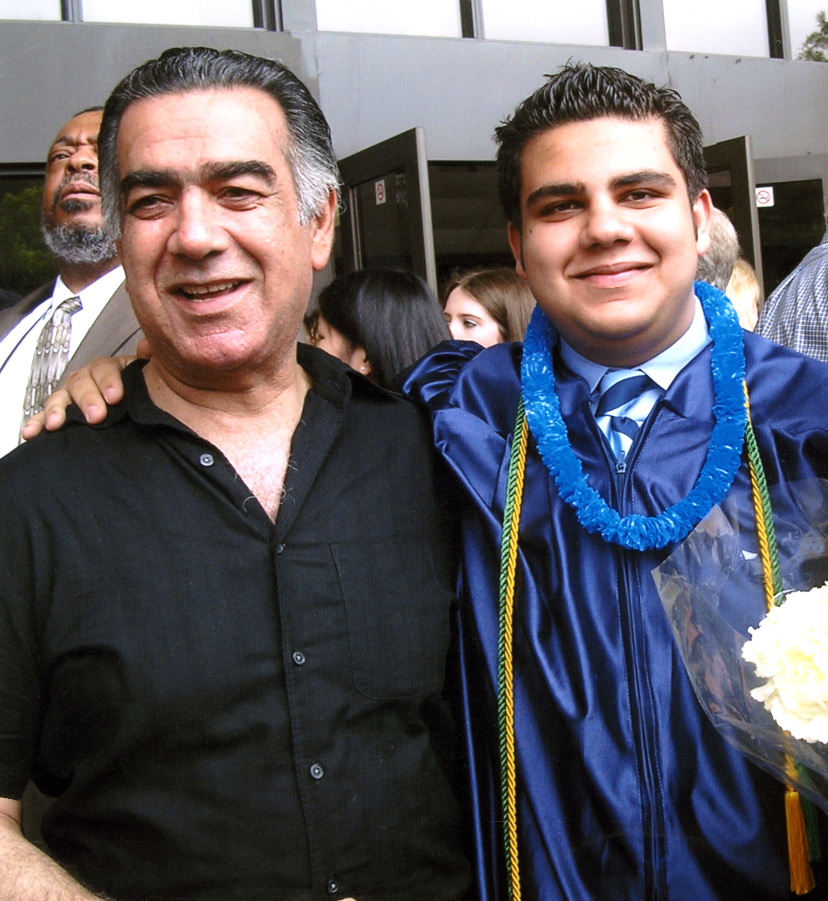 Mohammad Arif Sherdel at a graduation