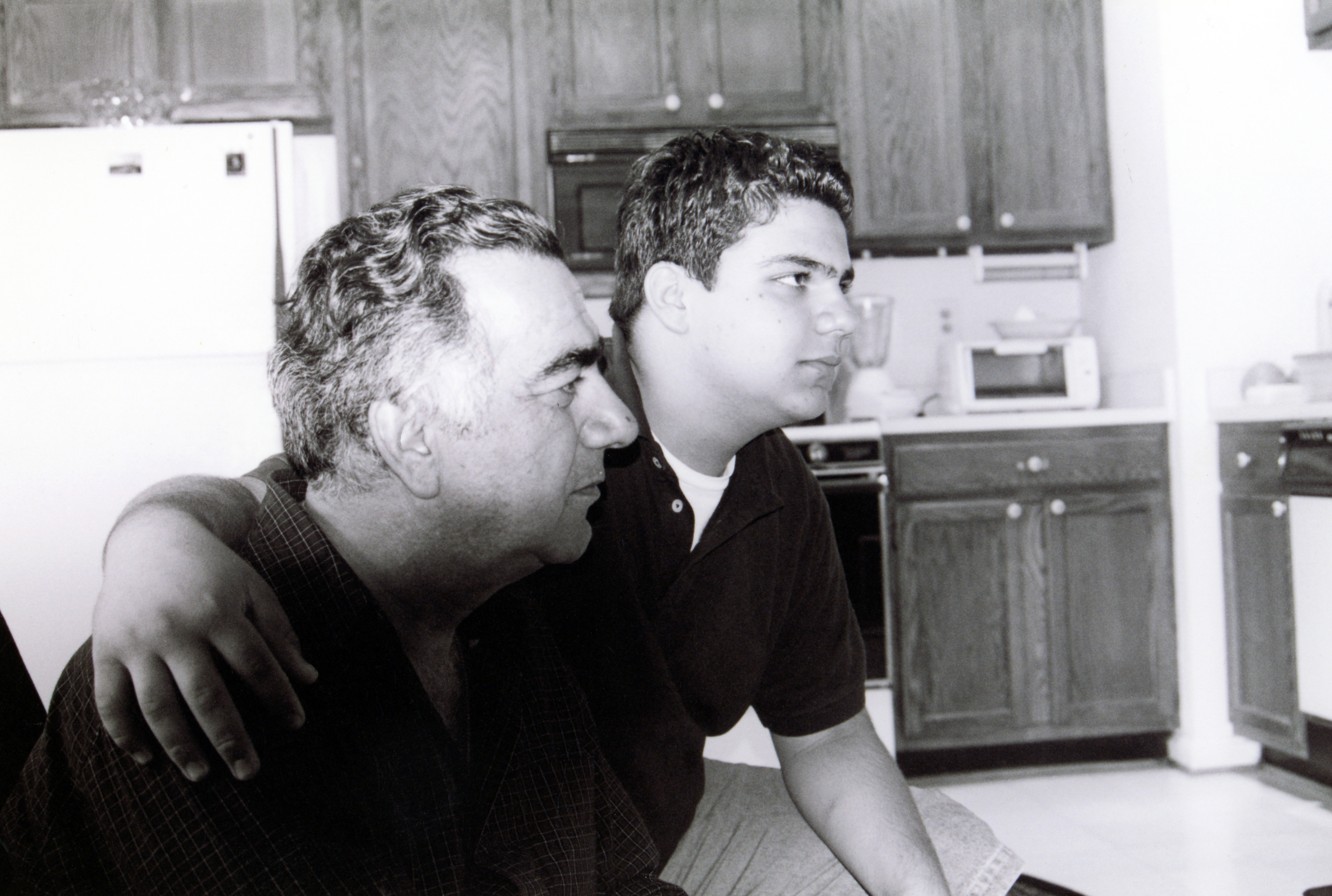 Mohammad Arif Sherdel with his son